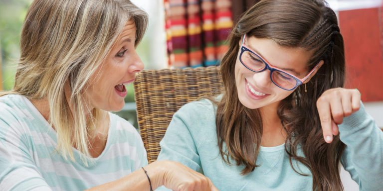 Picture of a woman teaching a girl