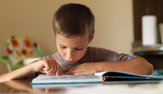 picture of a boy studying