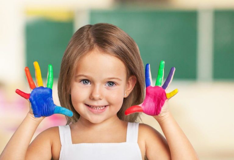 picture of a girl with her hands painted